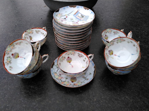 9 Chinese tea cups and 11 Chinese saucers