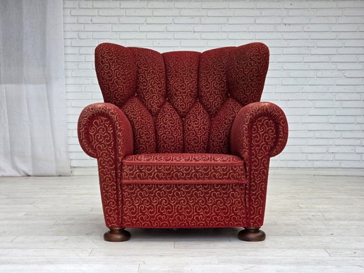 Poltrona relax danese degli anni '60, in lana rossa originale, gambe in legno di quercia.