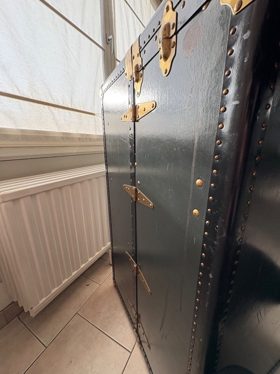 Image 1 of Oshkosh stoombootkoffer uit 1920