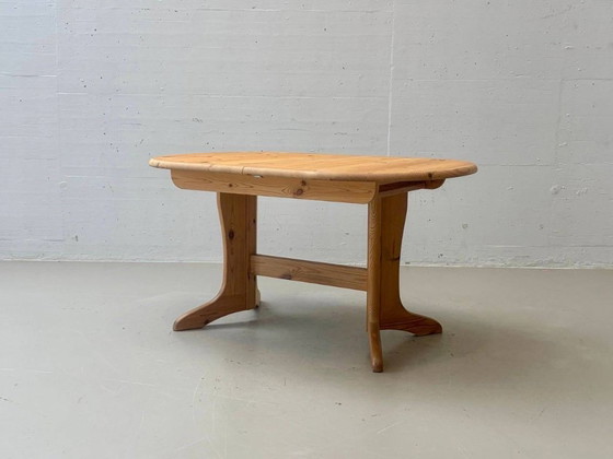 Round extendable vintage dining table made of solid pine wood, 1970s (photo 12 of 14)