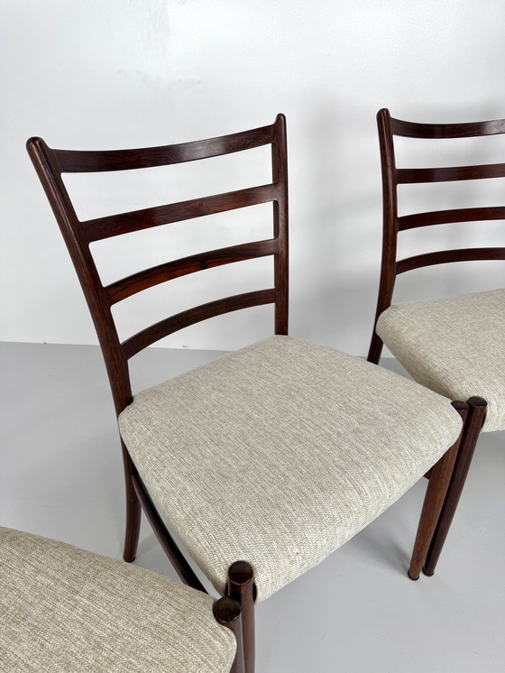 Image 1 of Set mit 8 Esszimmerstühlen aus Palisanderholz von Johannes Andersen – Schou Andersen Møbelfabrik