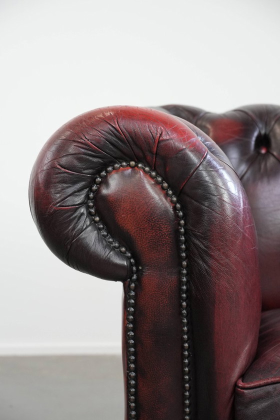 Image 1 of Englischer Chesterfield-Ledersessel auf Rollen, verziert mit Ziernieten