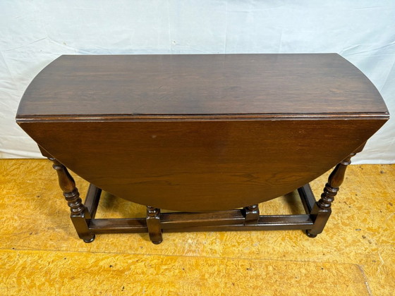 Image 1 of Jacobean Revival massief eiken klaptafel met neerklapbaar blad (circa 1900)