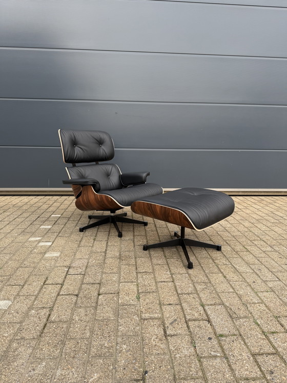 Image 1 of Sillón Eames Lounge original de Vitra + Otomana de palisandro