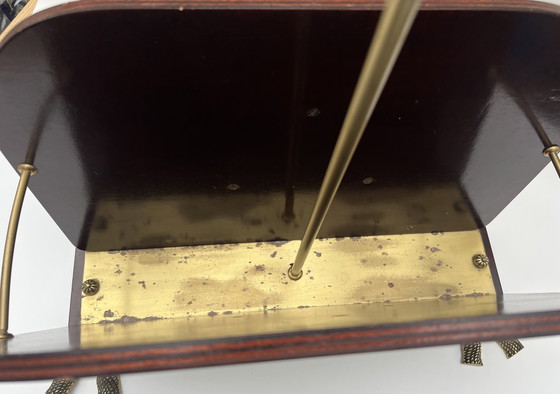 Image 1 of Portariviste decorativo in stile Impero – legno e ottone, piedini girevoli con nappe