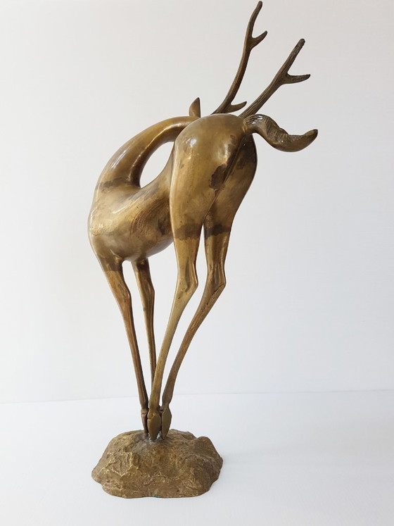 Image 1 of Important dancing stag, antelope, doe, and fawn in gilded brass, 1970s vintage 70s