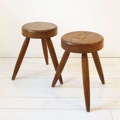 Pair of Perriand-style tripod stools.