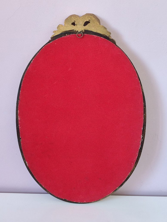 Image 1 of Specchio ovale antico dorato con frontone