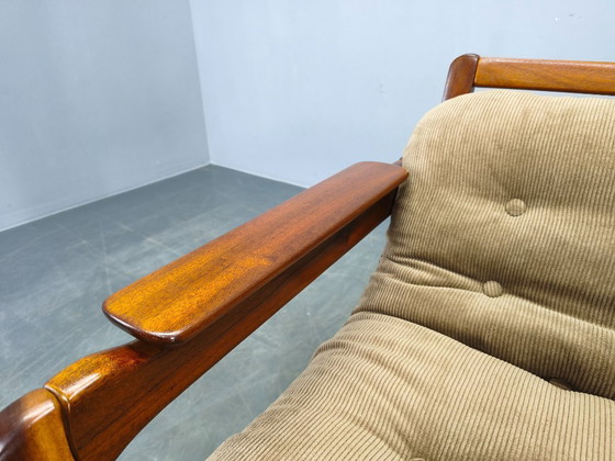Image 1 of Twee Scandinavische loungestoelen uit de jaren 70, gemaakt van hout met corduroy bekleding.