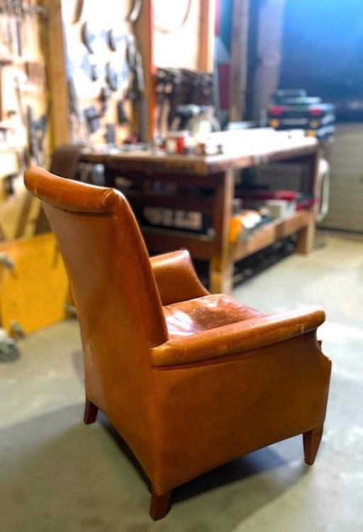 Ensemble de fauteuils/fauteuils club vintage en cuir, avec dossiers hauts et bas.