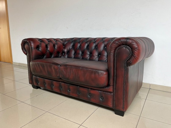 Image 1 of Chesterfield Sofa in Oxblood Leather – Fully Restored, Classic Design