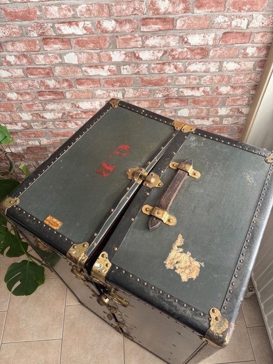 Image 1 of Oshkosh stoombootkoffer uit 1920