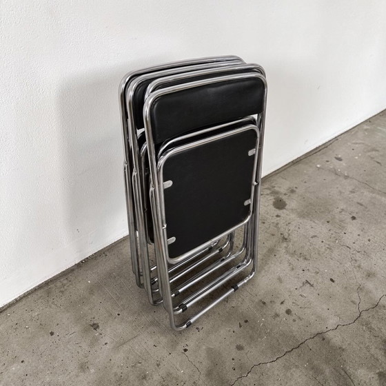 Image 1 of Set van 4 opklapbare stoelen in chroom- en leerstijl uit het midden van de 20e eeuw, Italië, jaren 70.