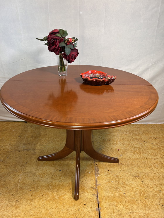 Image 1 of Mid-Century Retro Vintage Teak Extending Round Dining Table by Parker Knoll – 1970  Elegant | Space-Saving | Practical | Iconic 