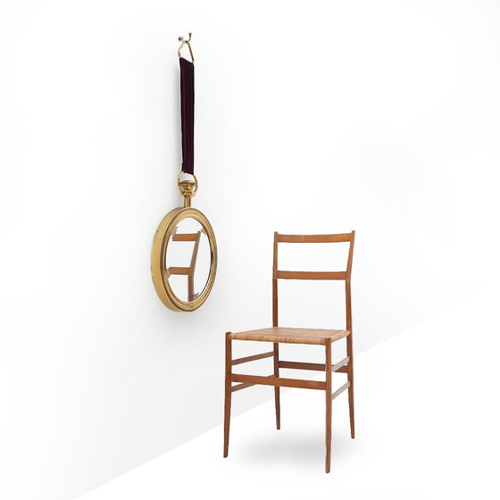 Image 1 of Specchio rotondo in ottone montato a parete, anni '50