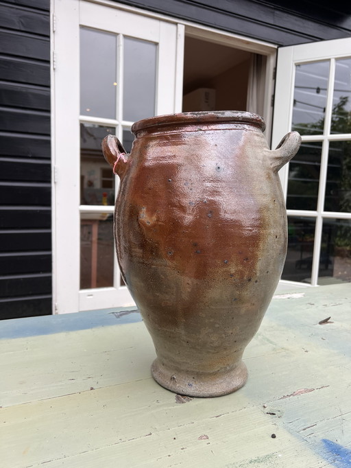 Antieke grijs bruine voorraad inmaak pot groot