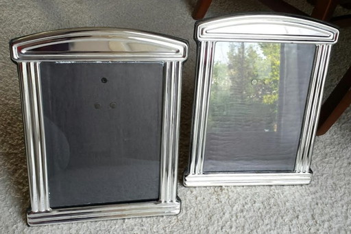 Due grandi cornici portafoto argentate