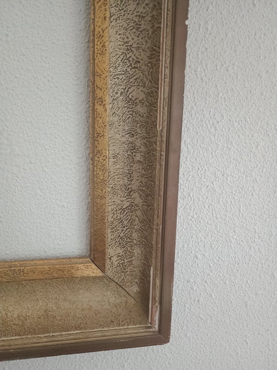 Image 1 of Large gold-colored frame