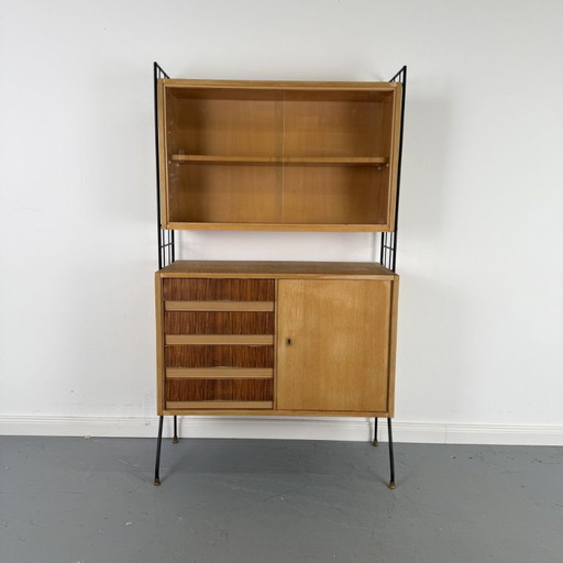 Elegant Mid - Century shelf with display cabinet and chest of drawers in string look