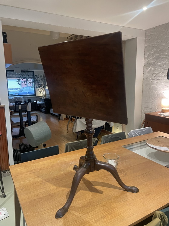 Image 1 of Tilt top table