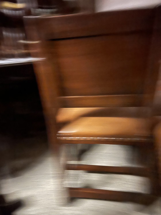 Image 1 of 6 Esszimmerstühle aus Kirschholz mit Schaffellbezug
