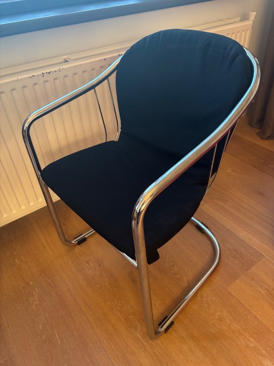 Image 1 of 4 vintage design tubular frame chairs with wire steel shell and black seat
