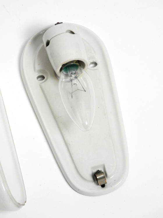 Image 1 of A Mid Century Modern Wagenfeld glass ceramic wall lamp