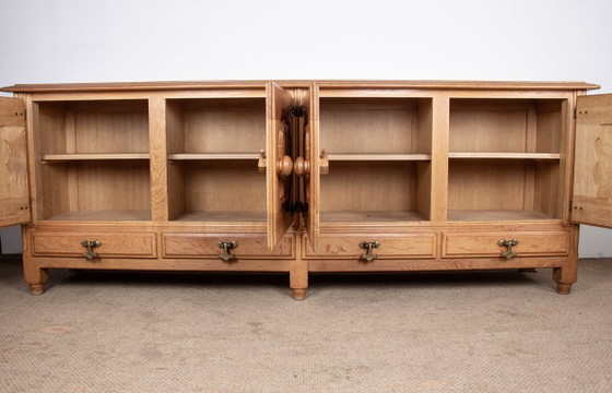 Image 1 of Very large French sideboard in solid oak by Guillerme and Chambron for Your Home 1960.