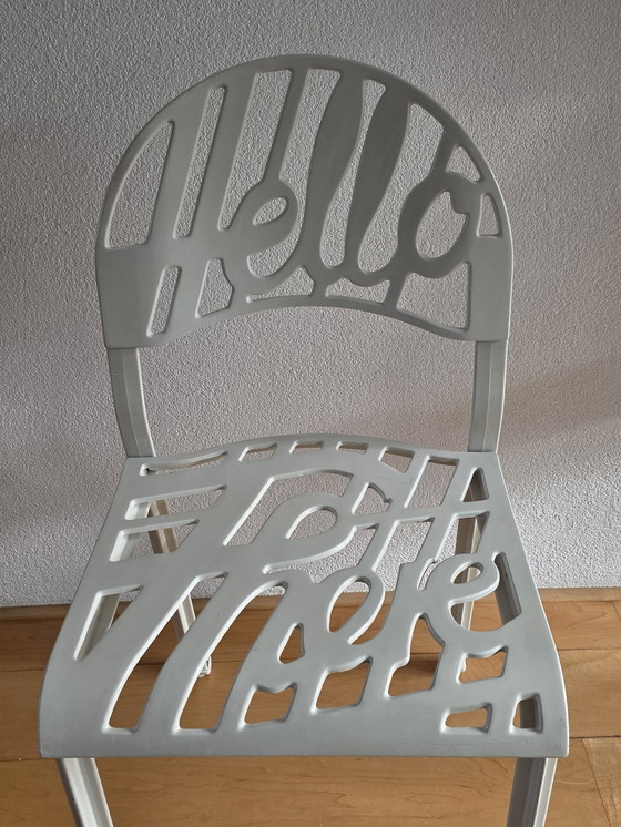Image 1 of 2 white aluminum "Hello There" chairs designed in 1978 by Jeremy Harvey