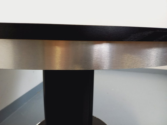 Image 1 of Table ronde de repas vintage en mélaminé esprit bois noir et métal chromé style Space Age / Diner des années 70 avec rallonge in