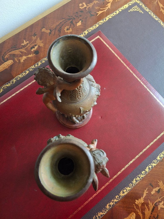 Image 1 of Pair of Art Nouveau spelter vases, circa 1900, with cherubs and a double patina