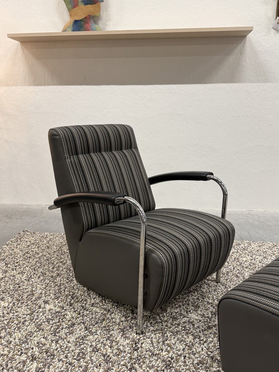 Image 1 of Leolux Scylla high armchair with Belluno fabric pouf in gray leather