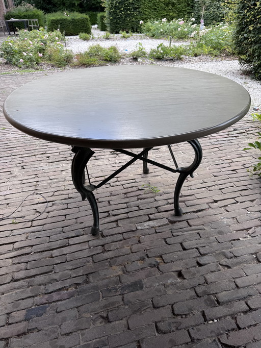 For sale antique table with cast iron decorative base