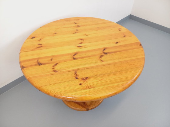 Image 1 of Vintage Scandinavian round dining table by Rainer Daumiller in pine from the 1960s/70s with extensions