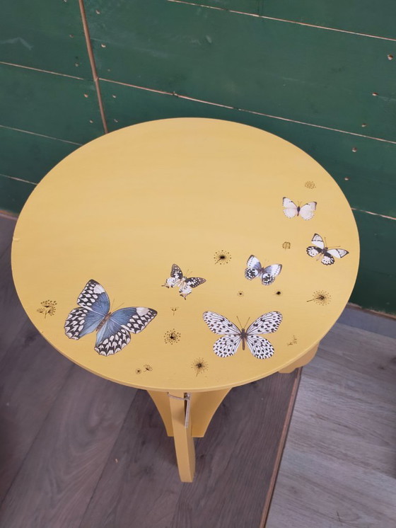 Image 1 of Round table with butterflies