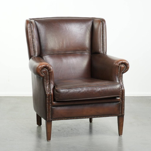 Wunderschöner, dezenter Ohrensessel aus Schaffell in einem tiefen Cognac-Ton mit bequemer Sitzfläche – fauteuils, Leather