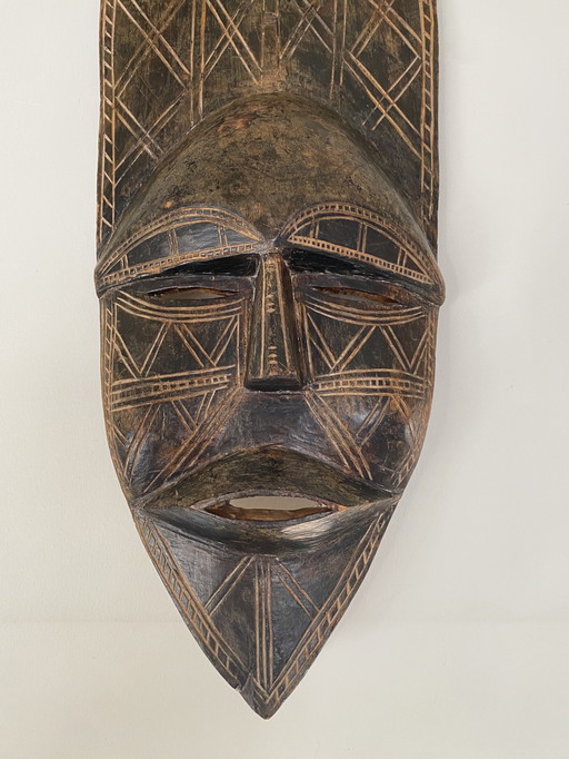 Hand-carved wooden ritual mask