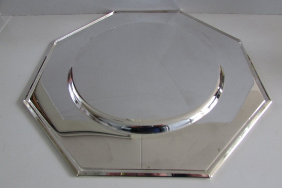 Image 1 of Dos platos base plateados en su embalaje original.