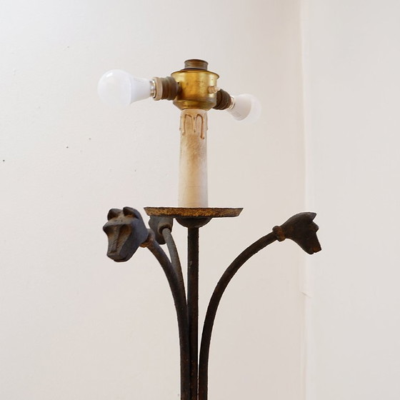Image 1 of Wrought-iron tripod floor lamp adorned with stylized animal heads