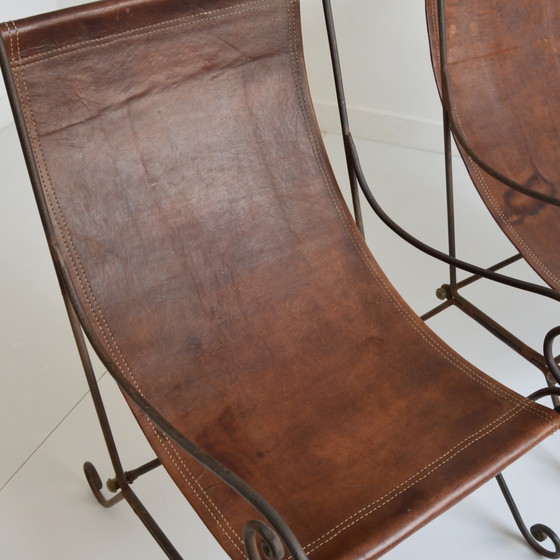 Image 1 of Paire de fauteuils en fer forgé et cuir vintage
