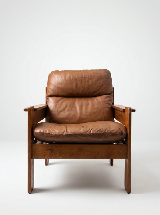 Image 1 of Vintage brutalistische bank en fauteuil in cognacbruin leer uit de jaren 60/70.