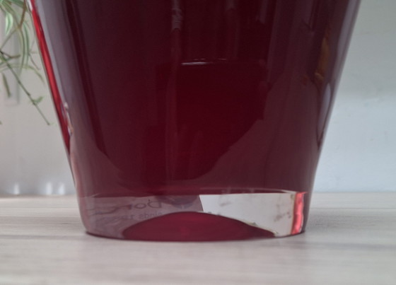 Image 1 of Solid red handkerchief vase.