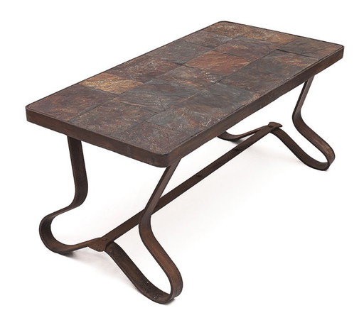 Brutalist coffee table by Adnet