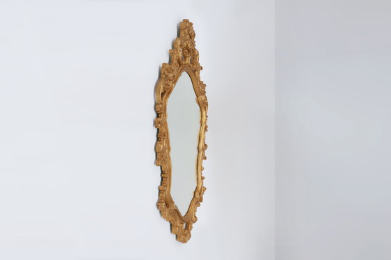 Image 1 of French Rococo or Baroque style facet-cut crest mirror in gilded carved wood