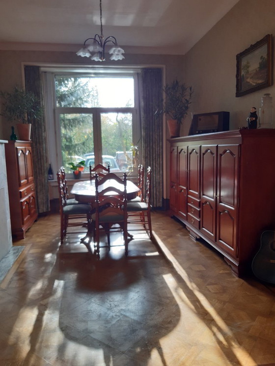 Image 1 of Cherry dining room with table, 6 chairs, bar cabinet and sideboard