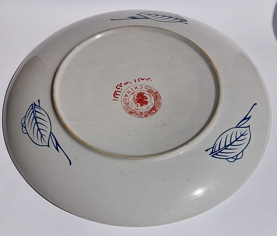 Image 1 of Large Chinese decorative plate with traditional Middle Eastern and Islamic patterns.