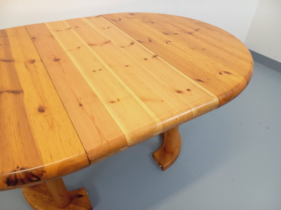 Image 1 of Vintage Scandinavian round dining table by Rainer Daumiller in pine from the 1960s/70s with extensions