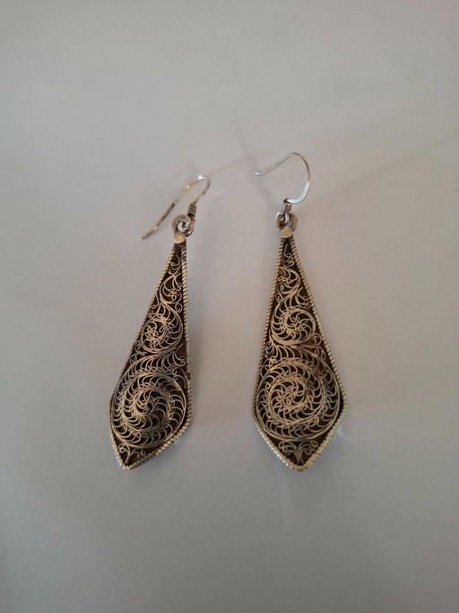 Tibetaanse oorbellen van massief zilver.