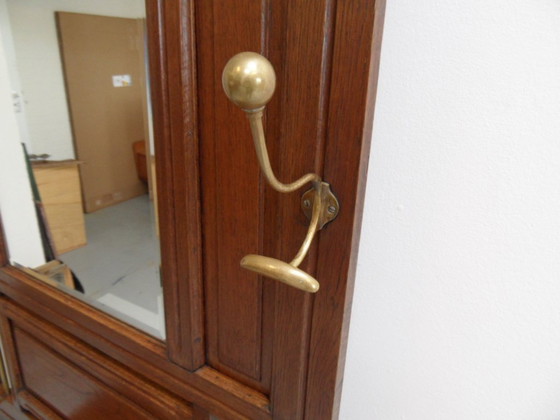 Image 1 of Antique standing coat rack with mirror