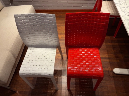 4 Kartell design chairs 2 reds and 2 whites